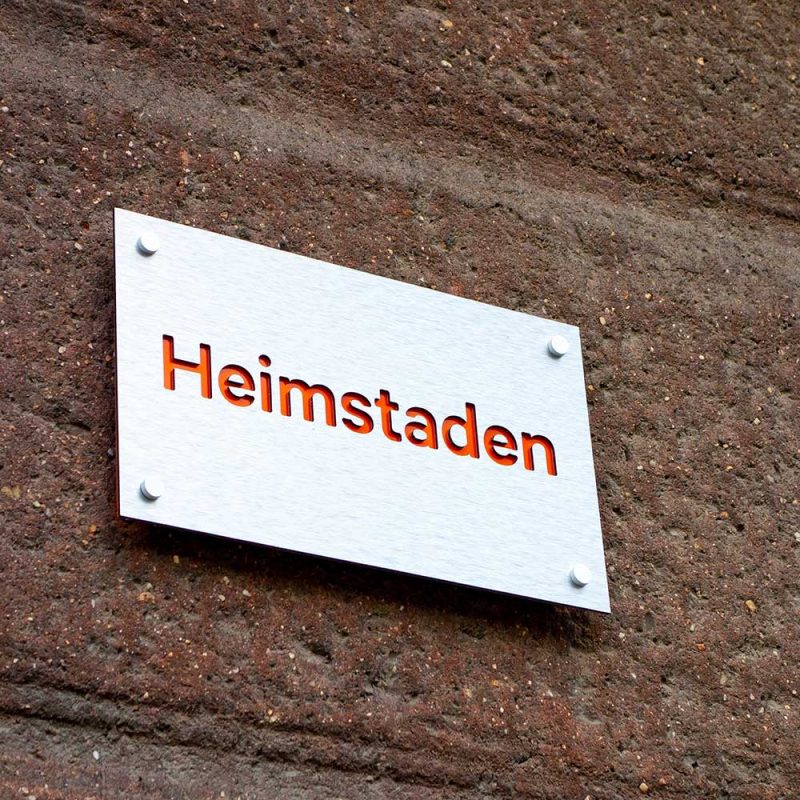 Heimstaden sign on wall